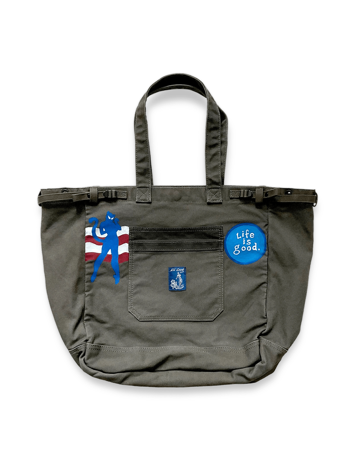 1970年代レトロウォッシュドキャンバスショルダートートバッグの全体像を展示し、そのクラシックな魅力とディテールが強調されています。