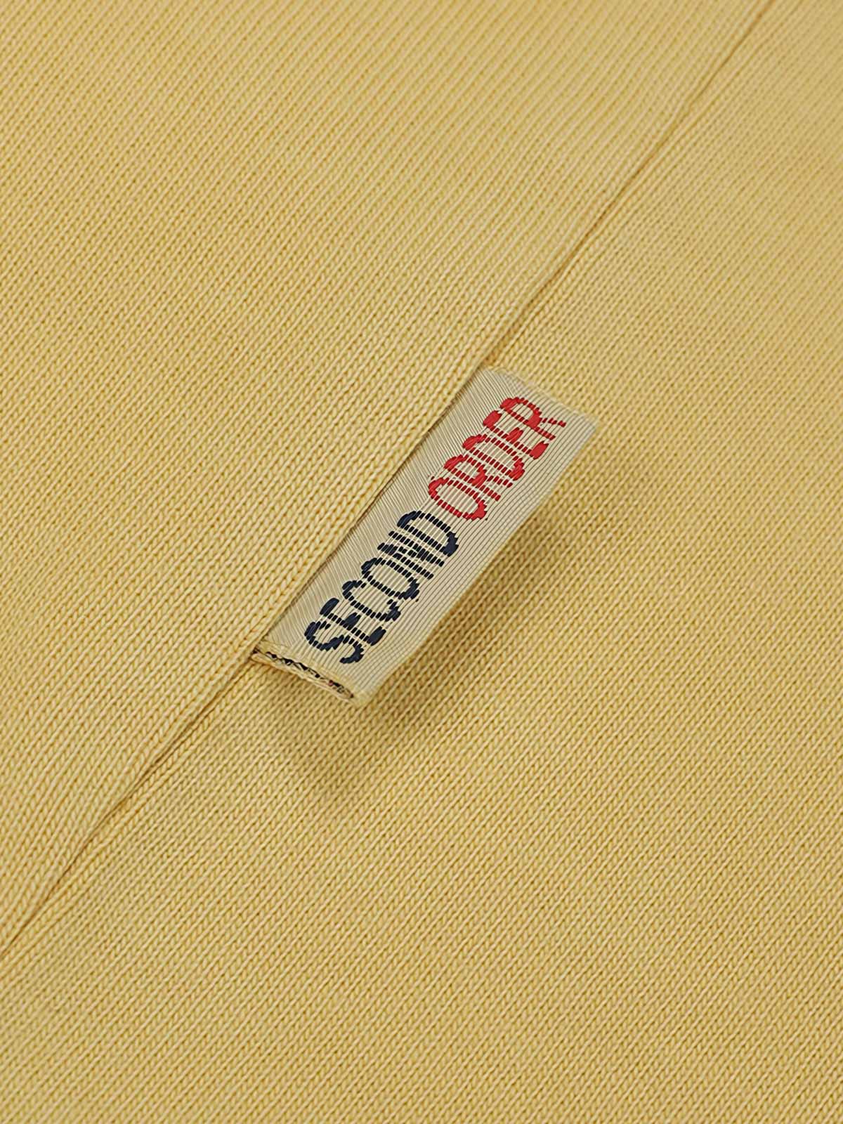 1980 Running Race バティックアメリカンプリントオーバーサイズ半袖Tシャツの細部展示、プリントと生地のテクスチャを含む