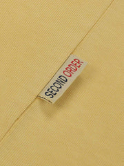 1980 Running Race バティックアメリカンプリントオーバーサイズ半袖Tシャツの細部展示、プリントと生地のテクスチャを含む