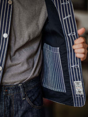 製品画像: アメカジヴィンテージウォッシュキャンバスベストの平置き写真
詳細画像: ストライプデザインと織り模様のディテールショット