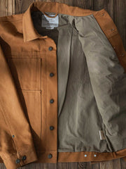 ジャケットのディテールショット、帆布の質感と裏地のディテールを展示