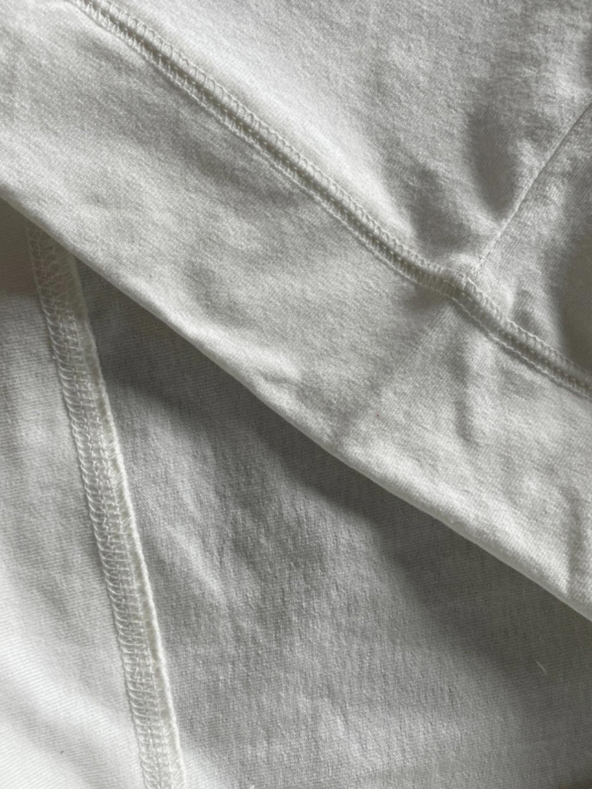 アメリカンヴィンテージウォッシュドコットンラグランスリーブTシャツ2枚セットの細部画像、高品質コットン素材と厚いリブネックを示す