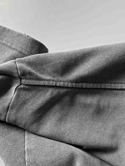 300gコットンサンドウォッシュヴィンテージエッジTシャツの細部画像。ヴィンテージ加工と毛羽立ちデザインを表示。