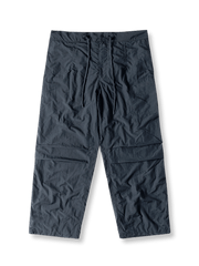 製品画像: 180gナイロン素材のダブルレイヤーパラトルーパーパンツ
詳細画像: 多ポケットとウエスト調整機能のディテール