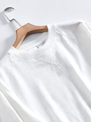 製品画像: ヘビーウェイト竹節糸長袖Tシャツの正面展示
詳細画像: リブネックとラグランスリーブのディテール展示