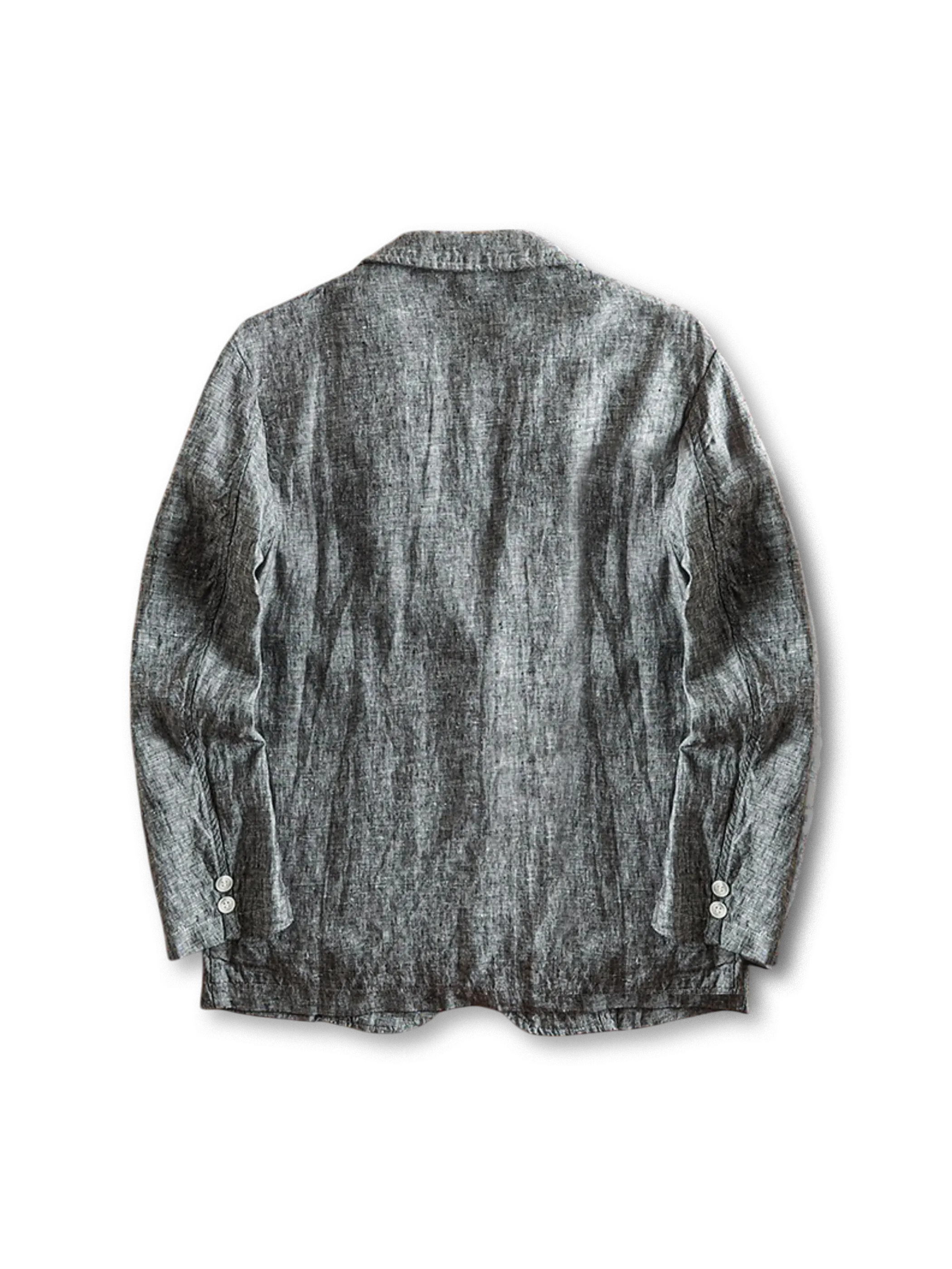 リネンブレンドのテーラードジャケット、フロントに二つボタンとパッチポケットが見える