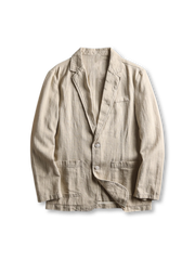 リネンブレンドのテーラードジャケット、フロントに二つボタンとパッチポケットが見える