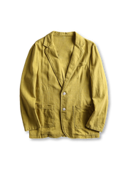 リネンブレンドのテーラードジャケット、フロントに二つボタンとパッチポケットが見える