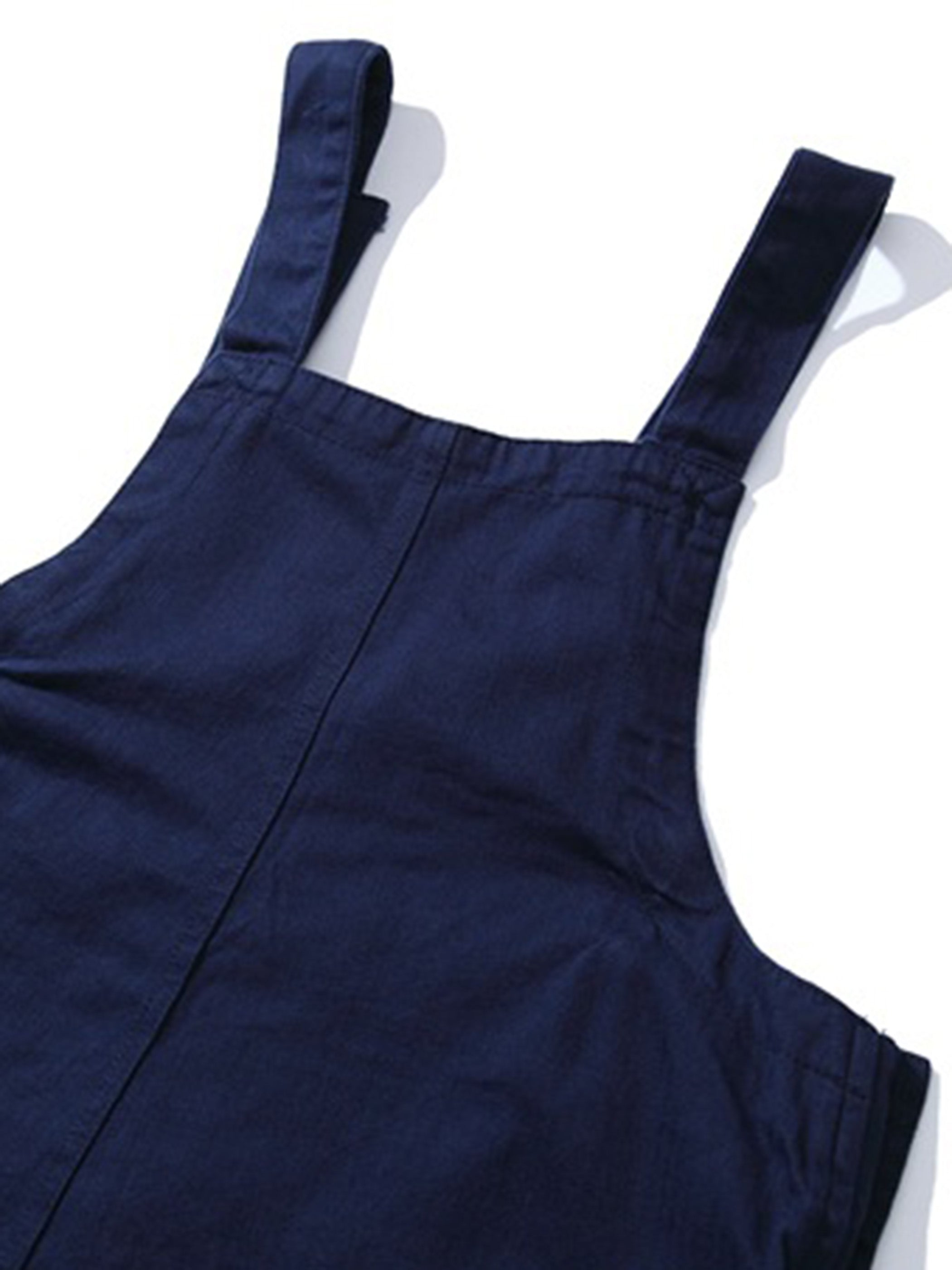 詳細画像: 調節可能なメタルジッパーと丁寧なステッチ、ポケットディテールのクローズアップ