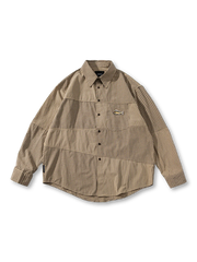 多様なチェックパターンのパッチワークを正面から捉えたシャツ