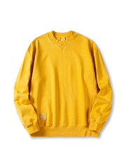 ウォッシュ加工を施したクルーネックスウェット、V字ガゼット付き