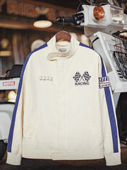 製品画像: ヴィンテージテイストのカラーブロック刺繍レーシングジャケットの正面ビュー