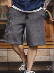 航海柄の刺繍入りショートパンツ - 船の錨デザイン