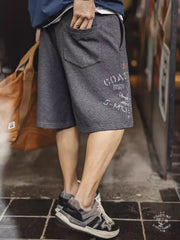 航海柄の刺繍入りショートパンツ - 船の錨デザイン