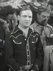 ブラックのコットンサテンウエスタンシャツ、襟やヨーク部分にオフホワイトのパイピングが施されている