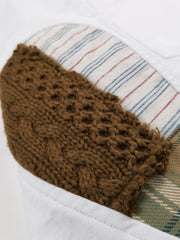 水滴型パッチワークが施されたオックスフォードシャツ全体像。肘部分のパネルが特徴的