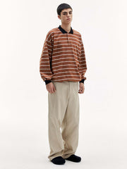 調節可能な裾ストライプ長袖ポロシャツ