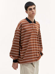 調節可能な裾ストライプ長袖ポロシャツ