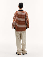 調節可能な裾ストライプ長袖ポロシャツ