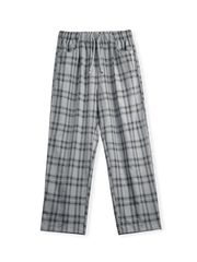 ターダンチェックのワイドパンツ、腰と裾にドローストリング付き。