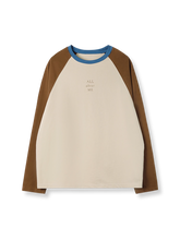 製品画像: 配色ラグランスリーブスリム長袖Tシャツ正面図