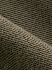 詳細画像: ヴィンテージブラウンワークポケットデニムミニスカートの細部図。ワークポケットとフリンジカットを展示。