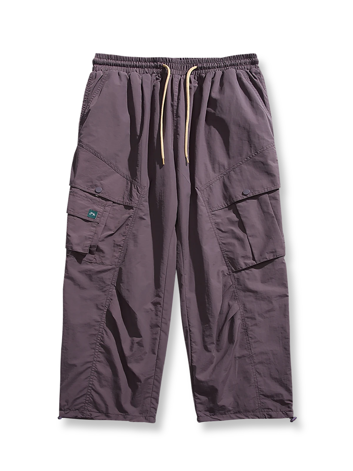 製品画像: 4色展開 アウトドア カーゴパンツ。100%ナイロン素材で耐久性と防風性を兼ね備えた、多機能パンツの全体展示図。
詳細画像: 裏起毛加工で保温性を高めた素材と、多ポケットディテールのクローズアップ。冬のアウトドア活動に便利な設計。