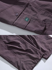 製品画像: 4色展開 アウトドア カーゴパンツ。100%ナイロン素材で耐久性と防風性を兼ね備えた、多機能パンツの全体展示図。
詳細画像: 裏起毛加工で保温性を高めた素材と、多ポケットディテールのクローズアップ。冬のアウトドア活動に便利な設計。