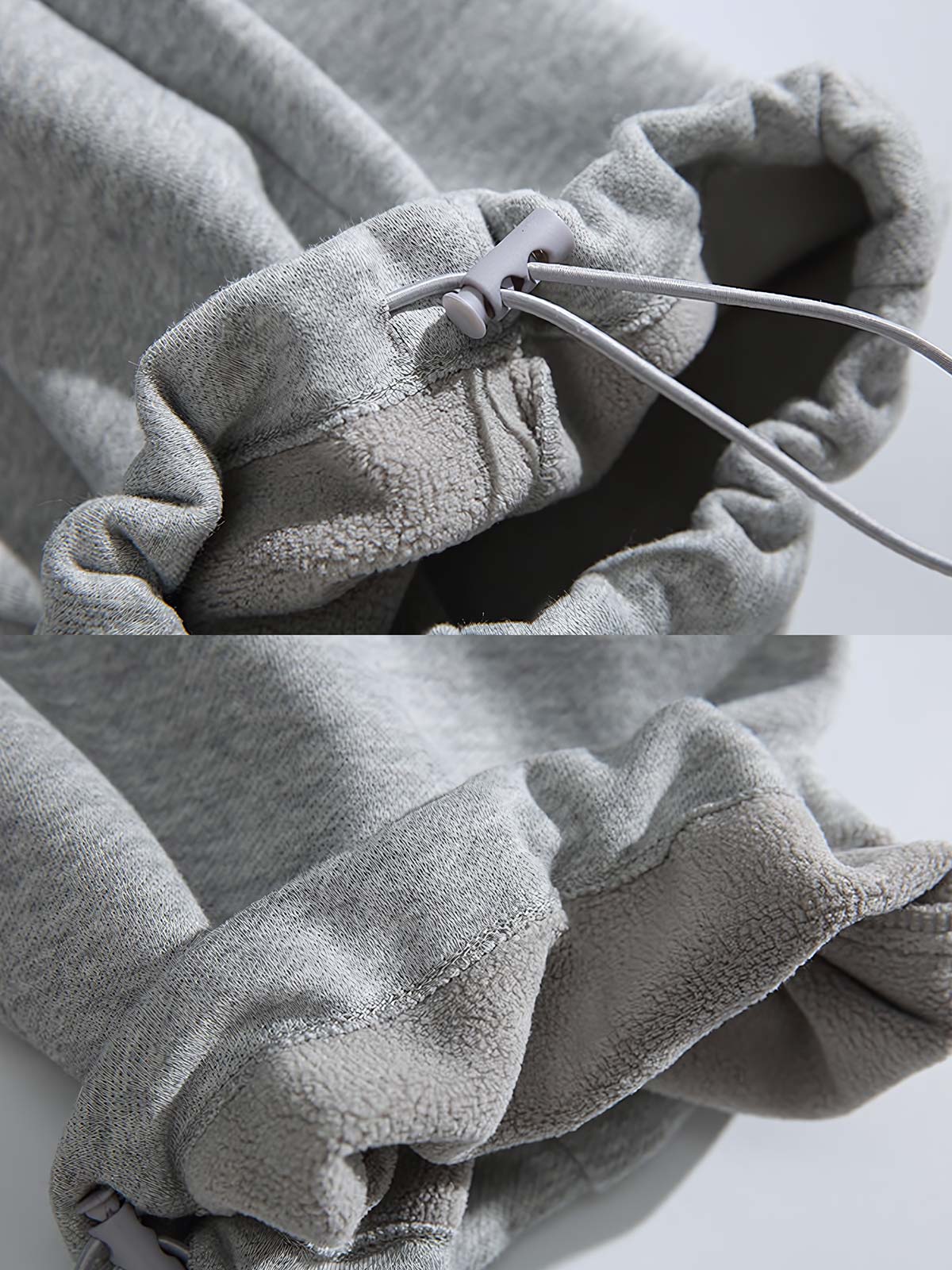 製品画像: 4色展開 カジュアル スウェットパンツ。裏起毛素材とルーズフィットデザインを採用した、冬に最適な厚手スウェットパンツの正面全体展示図。
詳細画像: 柔らかい裏起毛素材の質感と、冷気を防ぐ裾のリブデザインのディテールクローズアップ。