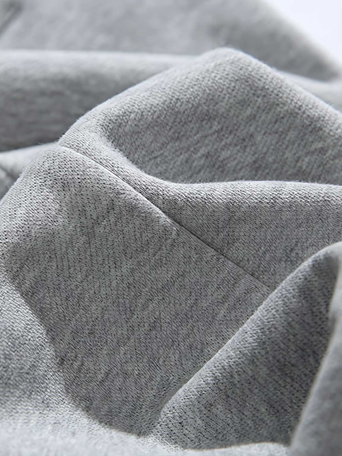 製品画像: 4色展開 カジュアル スウェットパンツ。裏起毛素材とルーズフィットデザインを採用した、冬に最適な厚手スウェットパンツの正面全体展示図。
詳細画像: 柔らかい裏起毛素材の質感と、冷気を防ぐ裾のリブデザインのディテールクローズアップ。