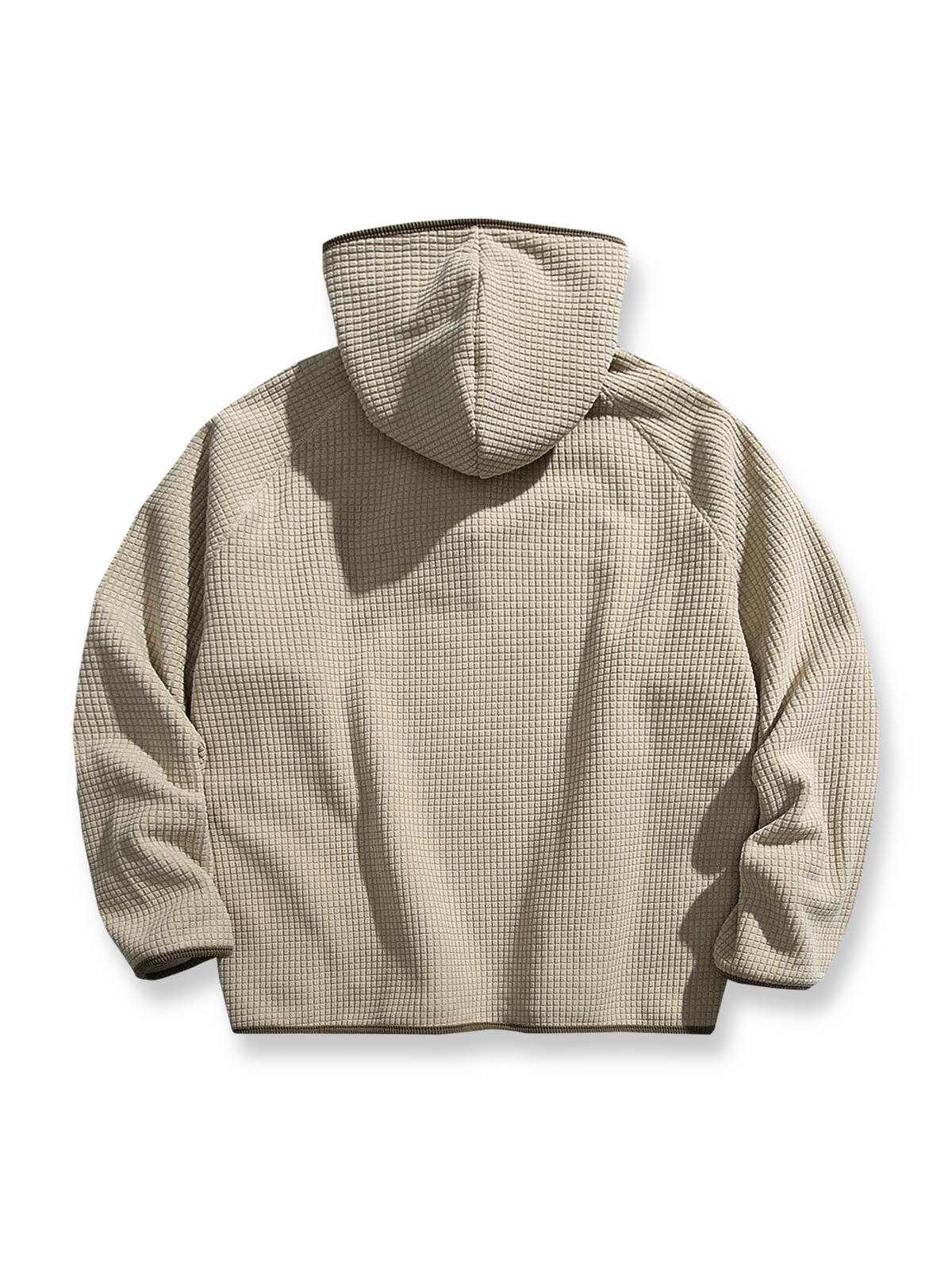 製品画像: 厚手ワッフル織りフード付きスウェット、ヴィンテージ感のあるデザインと裏起毛素材。寒い季節にぴったりの保温性を提供し、快適な着心地。
詳細画像: ワッフル織り生地と裏起毛のディテール。温かみのある厚手素材が、秋冬のコーディネートに最適。