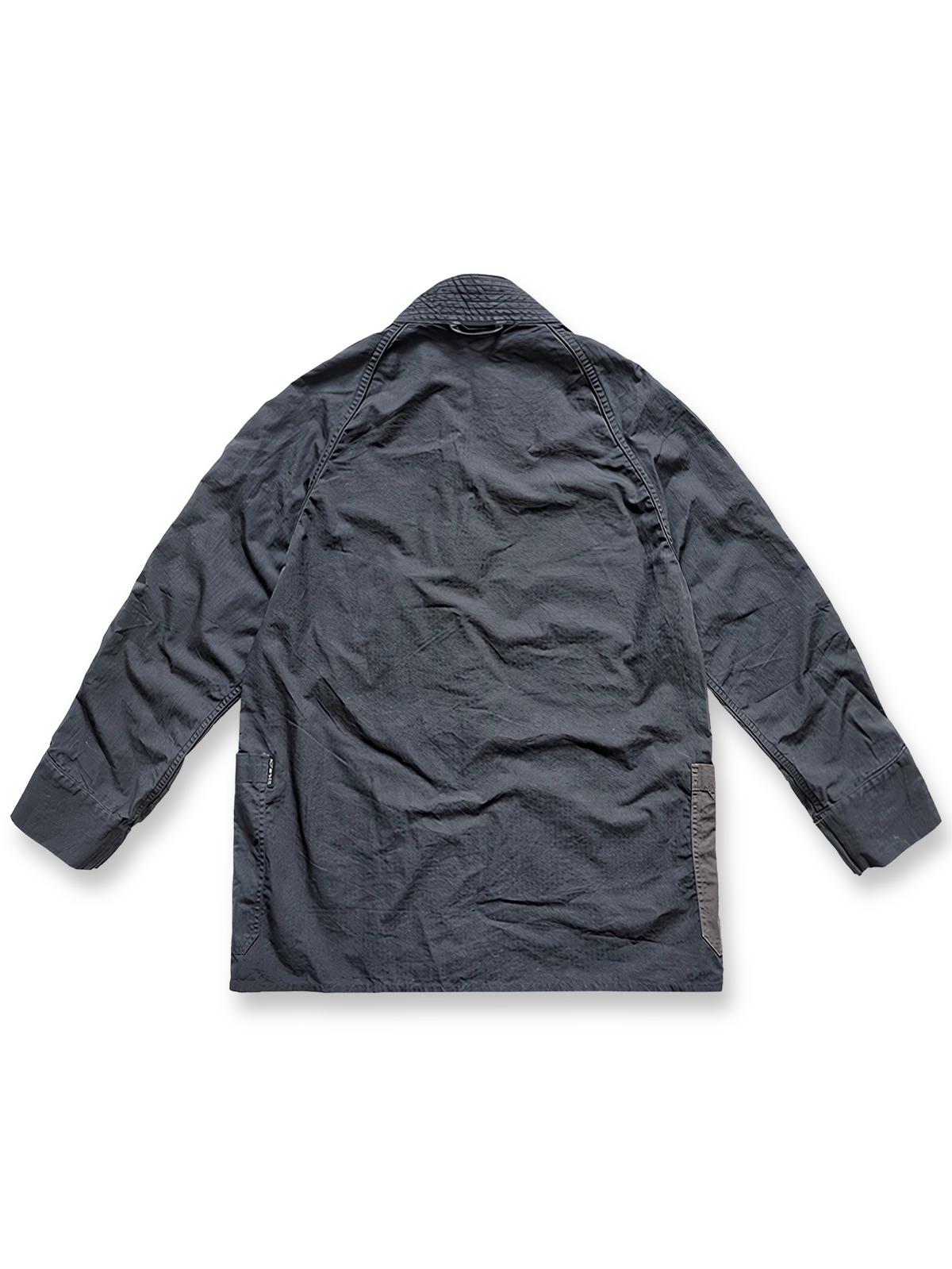 製品画像: 柔術メッシュリップストップはんてんのフロント全体画像。軽量で通気性に優れたリップストップメッシュを使用。
詳細画像: コットンメッシュとリップストップ生地のディテール画像。ヴィンテージ感のあるウォッシュ加工を施し、耐久性も向上。