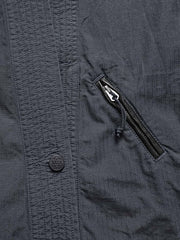 製品画像: 柔術メッシュリップストップはんてんのフロント全体画像。軽量で通気性に優れたリップストップメッシュを使用。
詳細画像: コットンメッシュとリップストップ生地のディテール画像。ヴィンテージ感のあるウォッシュ加工を施し、耐久性も向上。