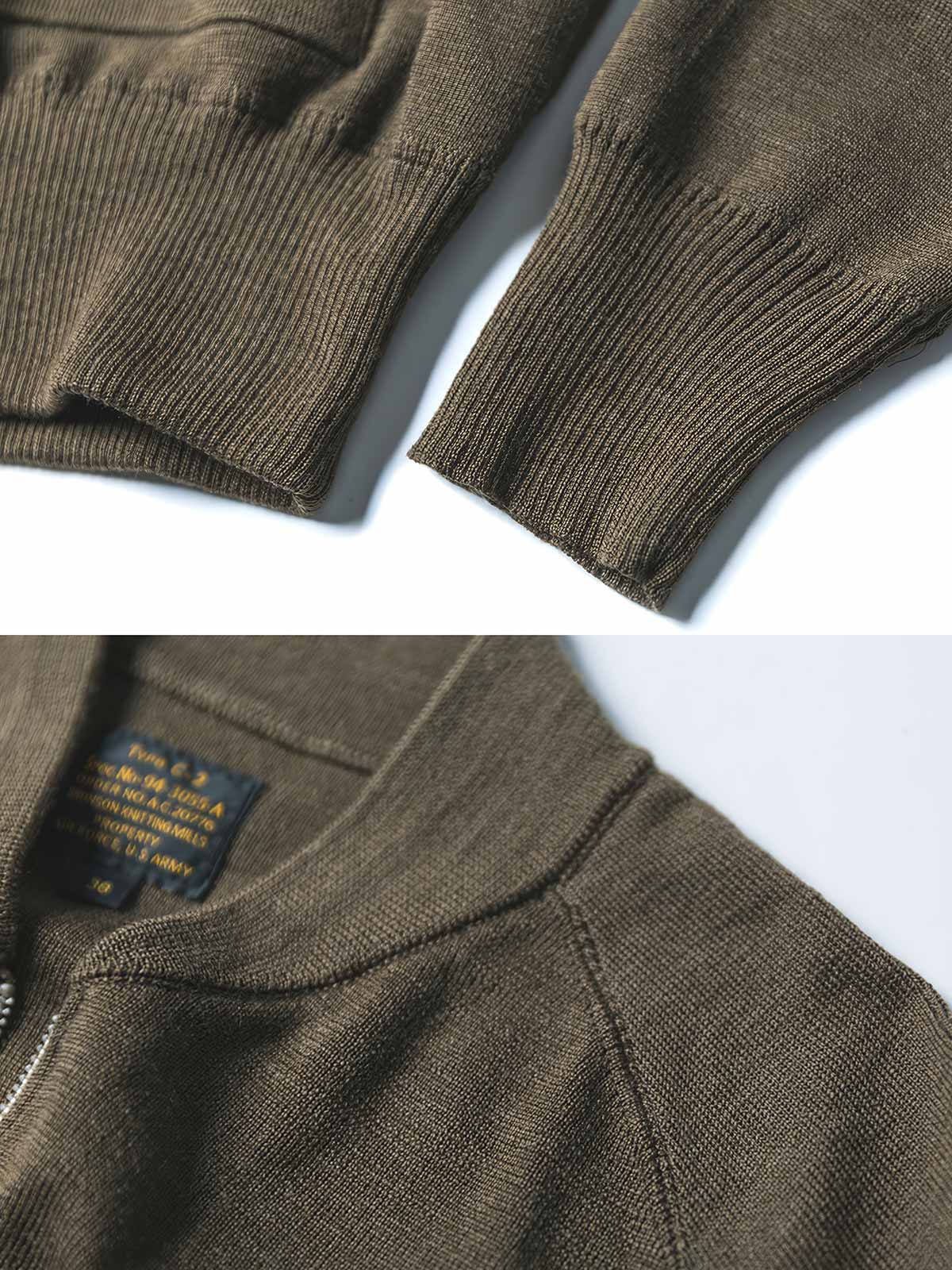 製品画像:
「リバイバル WWII C-2 ウールニット ジップアップカーディガンの全体展示図。1940年代のC-2軍用ニットを忠実に再現したヴィンテージ感あふれるデザイン。落ち着いたオリーブグリーンの配色とクラシックなジップアップスタイルが特徴。」
詳細画像:
「ジップディテールと隠しポケットの特写。C-2軍用ニットならではの実用性とデザイン性が見事に融合。」