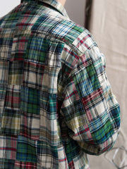 製品画像
「Patchwork Boroパッチワーク 長袖シャツの全体展示図。ヴィンテージ感漂うグリーンカラーとハンドメイドのBoroパッチワーク技法が融合したデザイン。個性的でエレガントな雰囲気が特徴。」
詳細画像
「パッチワークのディテールとグリーン基調の生地の特写。多様なチェック柄生地を組み合わせた、自然な手作り感とヴィンテージ感を強調したデザイン。」