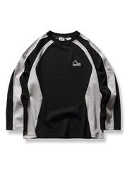 ダークブラウンとライトグリーンのバイカラーパッチワーククルーネックスウェットの正面展示