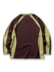 ダークブラウンとライトグリーンのバイカラーパッチワーククルーネックスウェットの正面展示