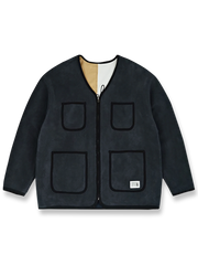 製品画像: パッチワークリバーシブルジャケットの正面展示、両面の異なるスタイルを紹介