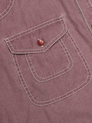 ポケットディテールと天然木製ボタンのクローズアップ