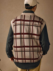 チェック柄ジャカードディテールと裾のスリットのクローズアップ