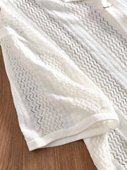 製品画像: オープンカラー透かし編みカーディガンの正面展示
詳細画像: 透かし編みのディテールとオープンカラーのデザイン展示