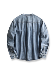 製品画像: ヴィンテージスタンドカラーデニムシャツの正面展示
詳細画像: スタンドカラーとウォッシュドデニムのディテール展示
