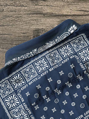 製品画像: インディゴブルーのペイズリー切り替えルーズフィットオープンカラー半袖シャツの全体像を正面から撮影した画像
詳細画像: ペイズリー切り替えシャツのディテール画像をクローズアップした画像