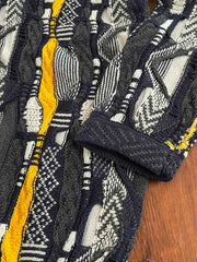 詳細画像: セーターの立体的なゴーヤ柄と編み込みのディテール