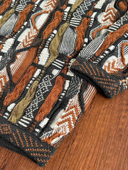 詳細画像: セーターの立体的なゴーヤ柄と編み込みのディテール