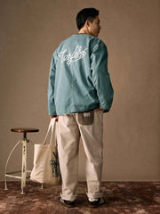 モデルが着用したヴィンテージフィッシングジャケットのスタイリング例