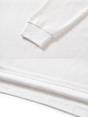 製品画像: ワッフルクルーネック カジュアルTシャツの正面ビュー
詳細画像: ワッフル生地のディテールとシルケット加工の質感を強調した特写