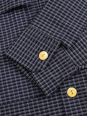 立体ポケットとヴィンテージ果実ボタンのディテール