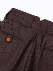 ウエストの調整可能なサイドタブと果実ボタンのディテール