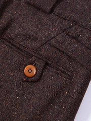 ウエストの調整可能なサイドタブと果実ボタンのディテール